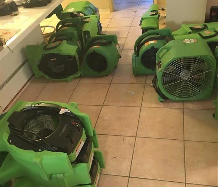 Air Movers set up in a kitchen